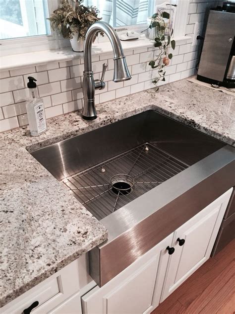 stainless steel farmhouse sink with white cabinets black countertops|farmhouse rustic white kitchen cabinets.